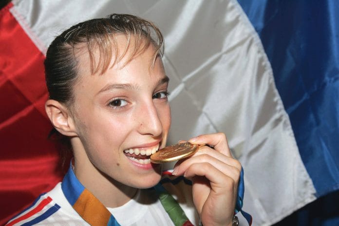 64483 03 Gold medalist Emilie Lepennec from France after winning the Womens Uneven Bars Final Gymnastic Artistic event a